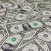 Aged $1 prop money stack with 100 full print bills